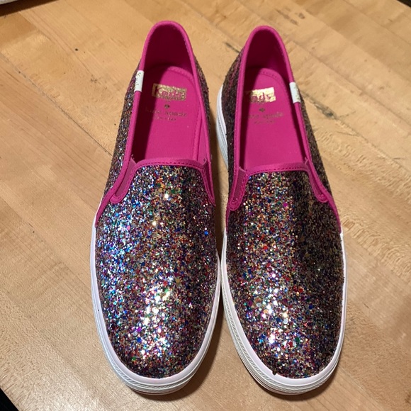kate spade Shoes - Beautiful glittery Kate Spade slip ons that’s great for the holidays !